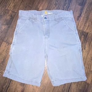 Men’s size 32 relaxed Carhartt shorts. They do have a stain on leg.